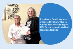 Attendee being presented with a certificate.