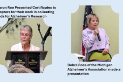 Left is speaker presenting Alzhiemer's Certificates with speaker from Michigan Alzheimer's Association on right