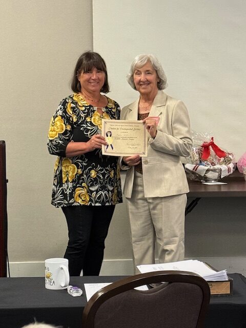 Woman receiving certificate