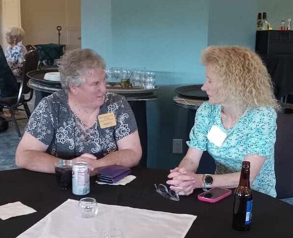 Two women sitting at a table