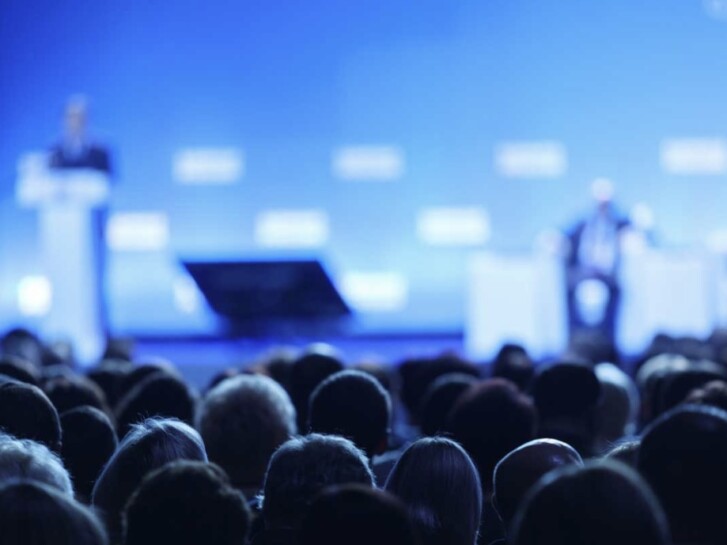Conference members in audience
