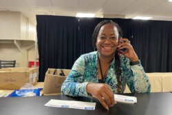 woman smiles at the photographer