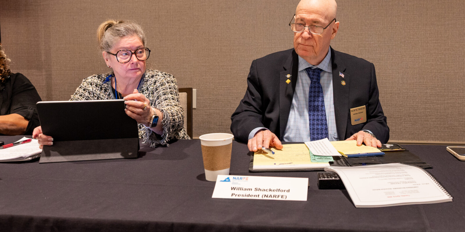 NARFE National President seated with the VFN 1st VP as they prepare for the conference meeting.