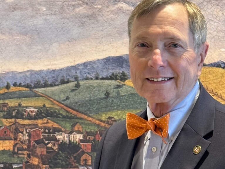Headshot for Region Vice President Robert Allen in front of a colorful mural