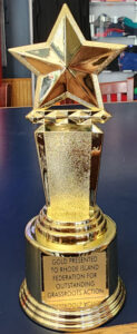 A photo of the Outstanding Grass Roots award to the Rhode Island federation of the National Active and Retired Federal Employees Association