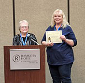 President of SD Federation presents Distinquished Service Award to member of the Sisseton Chapter