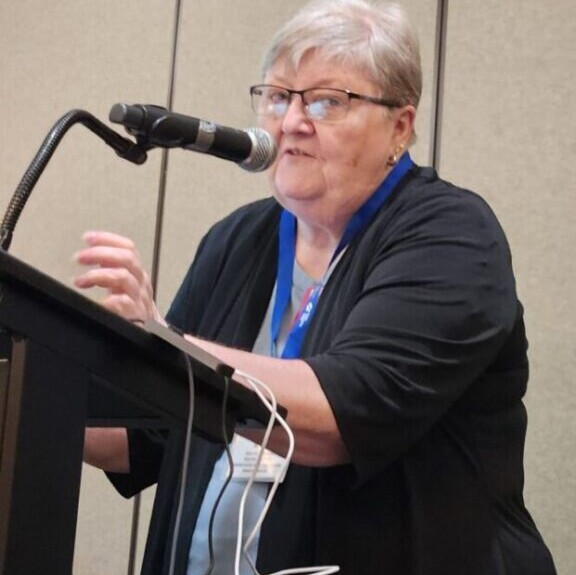 A lady presents information on living wills