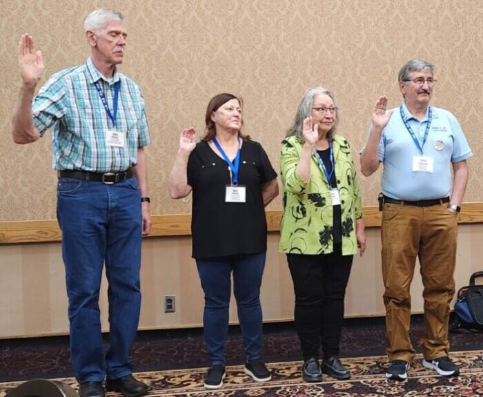 Four people are sworn in as officers of the NARFE SD Federation