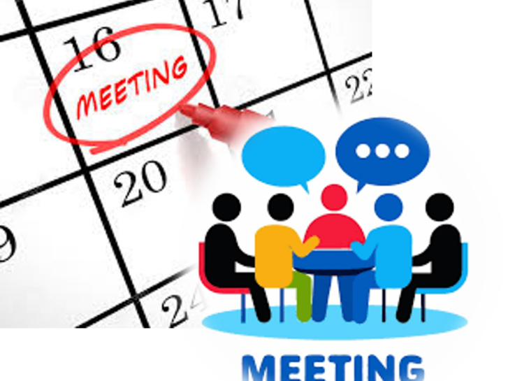 Five People sitting around a table for a Meeting with a Calendar reminding them