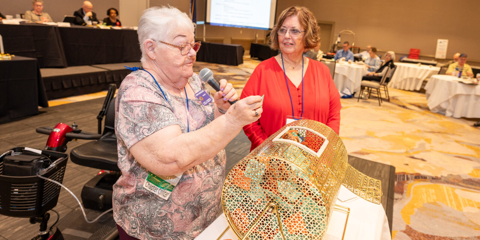 At the VFN Conference the Alzheimer's Coordinator is reading the name of a lucky winner