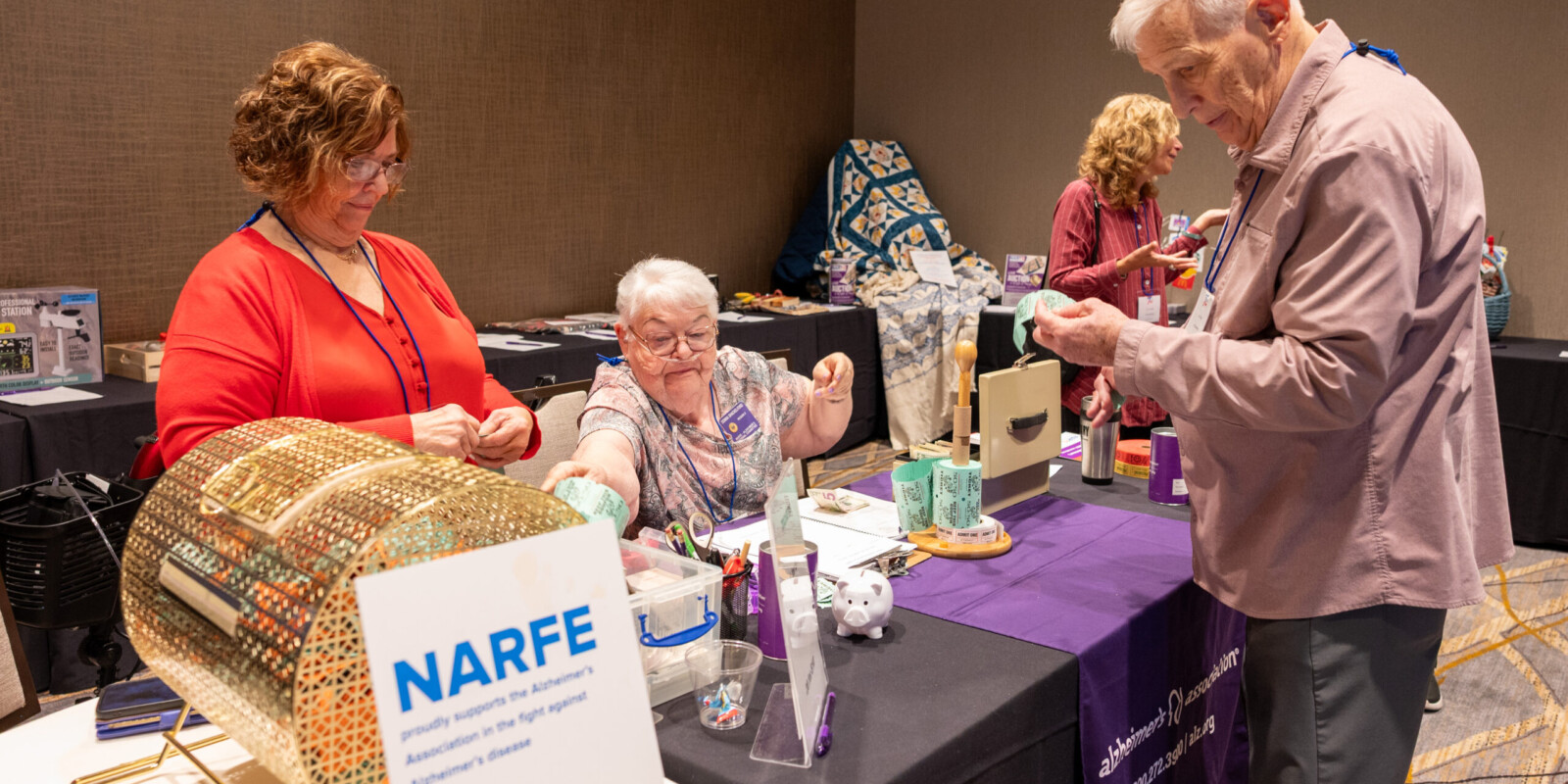 Alzheimers room at the VFN Convention with man purchasing tickets