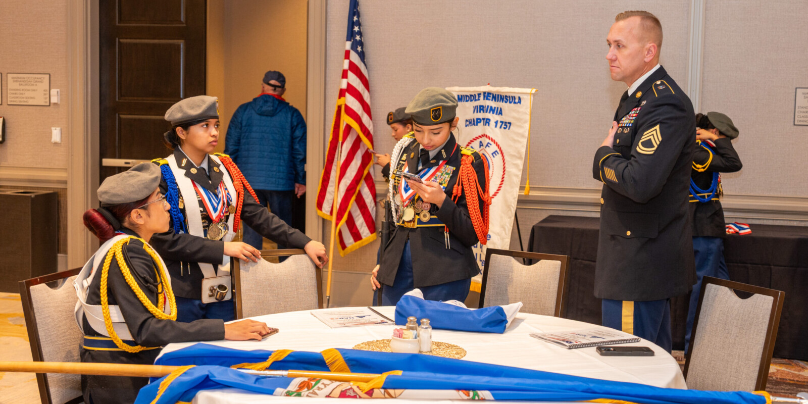 Harrisonburg Schools Honor Guard getting the last final instructions before making a presentation before the Virginia Federation of NARFE Conference.