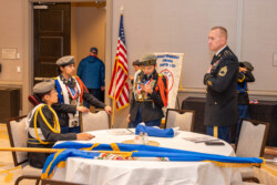 Harrisonburg Schools Honor Guard getting the last final instructions before making a presentation before the Virginia Federation of NARFE Conference.