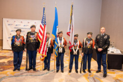 Harrisonburg Schools Honor Guard posing for a casual image with big smiles.