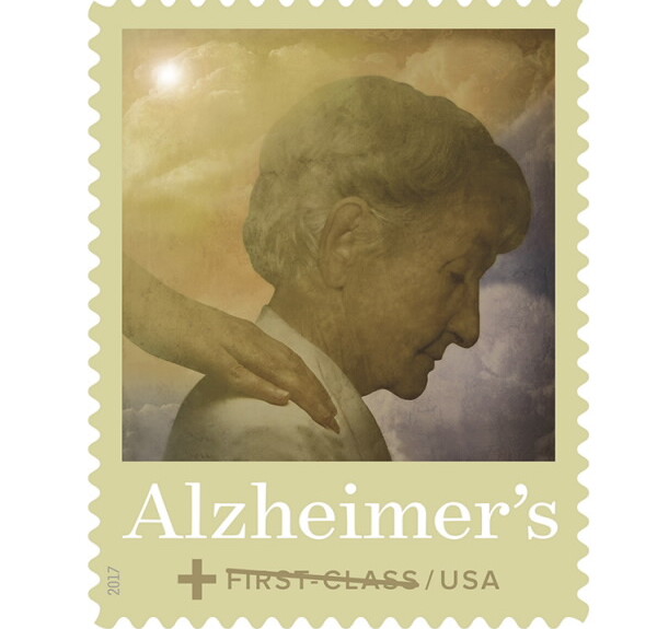 U.S. Postal Alzheimer's Stamp with the image of a lady and a hand on her shoulder