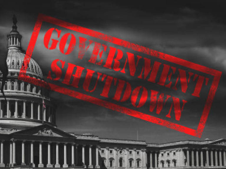 Portion of the Capitol with the words Government Shutdown written in red