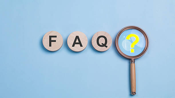 blue background with 3 circles spelling out FAQ and a magnifying glass with a question mark.