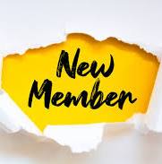 Yellow torn paper with New Member written on it in black ink.