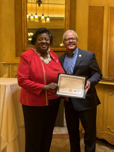 2025-12-15-State Legislation Chair presenting certificate to Delegate Luke Torian