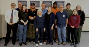Labor and union leaders with Sen Murray celebrating HR 82 1/10/2025